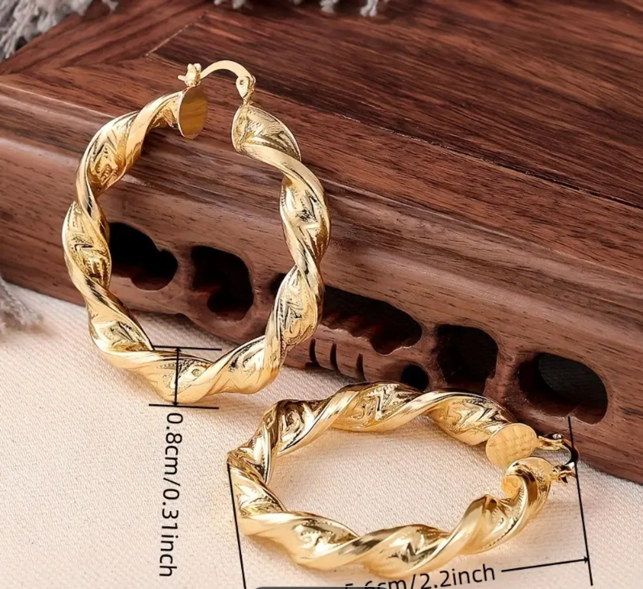 Orecchini intrecciati donna *33