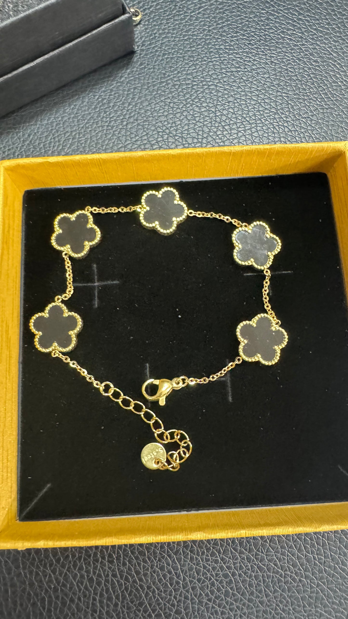 Bracciale quadrifoglio nero oro acciaio *26