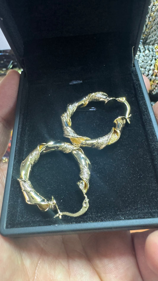 Orecchini intrecciati donna  *44