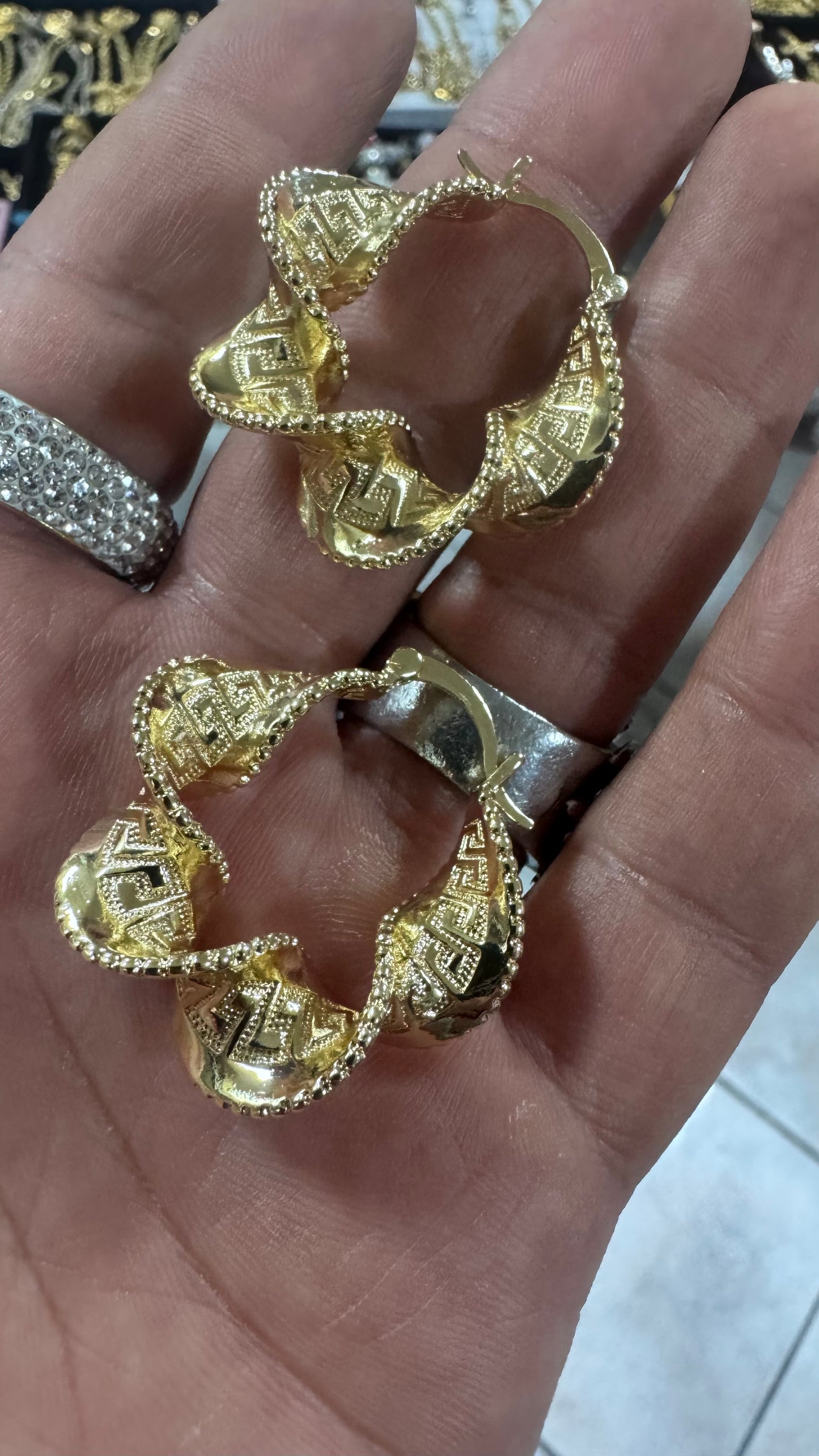 Orecchini intrecciati a cerchio *57