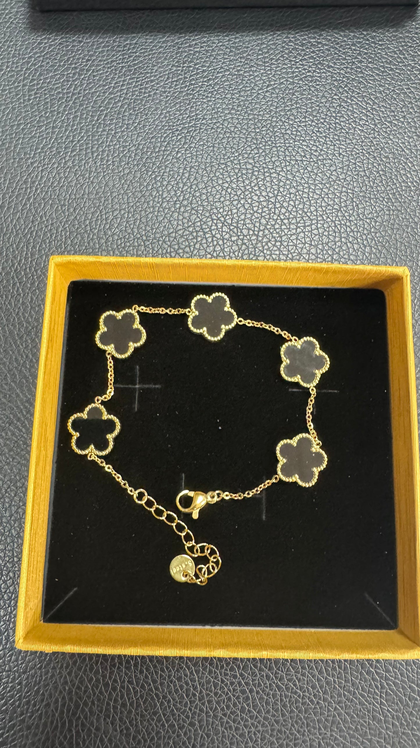 Bracciale quadrifoglio nero oro acciaio *26