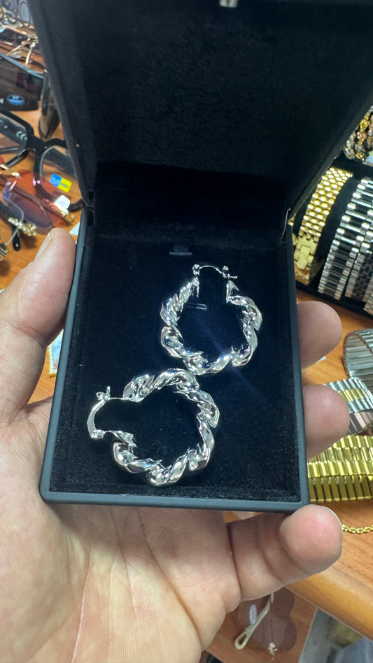 Orecchini intrecciati donna  *38