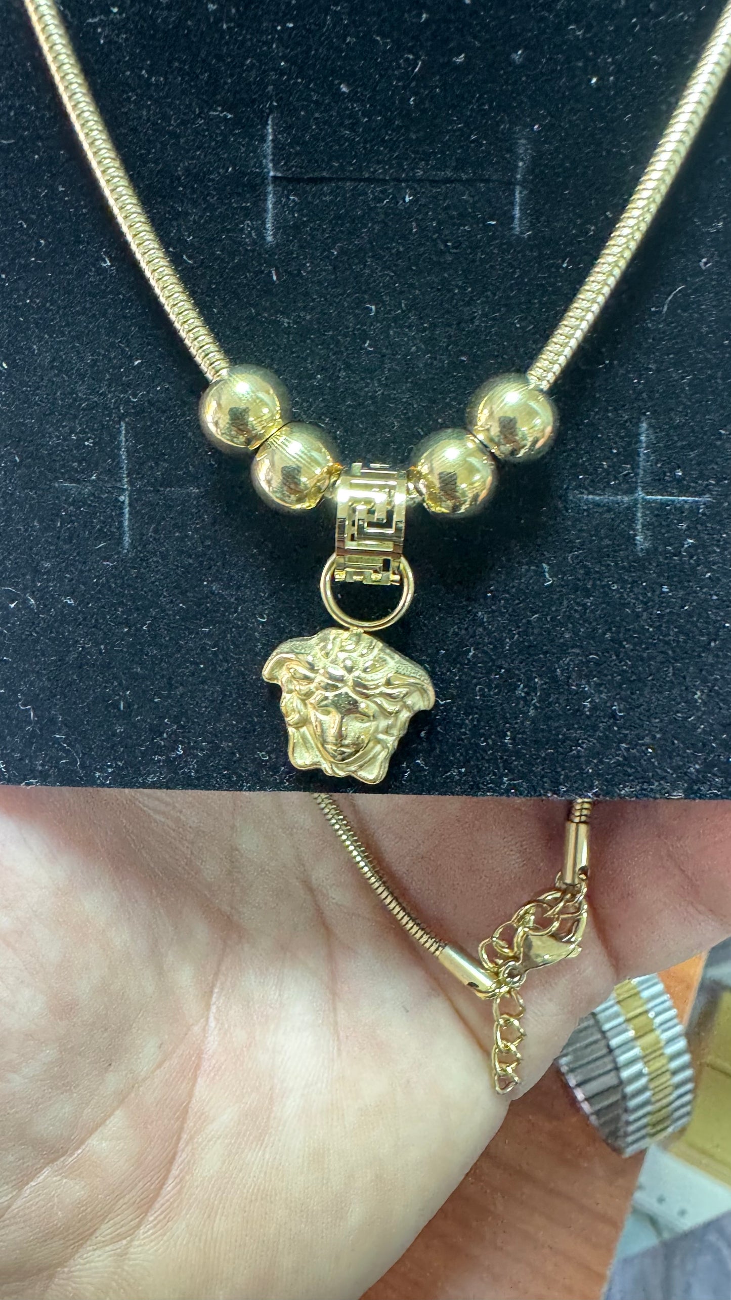 Collana con medusa oro acciaio *58
